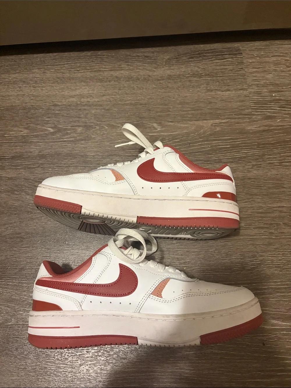 Women’s Nike White Sneakers with Red Swoosh